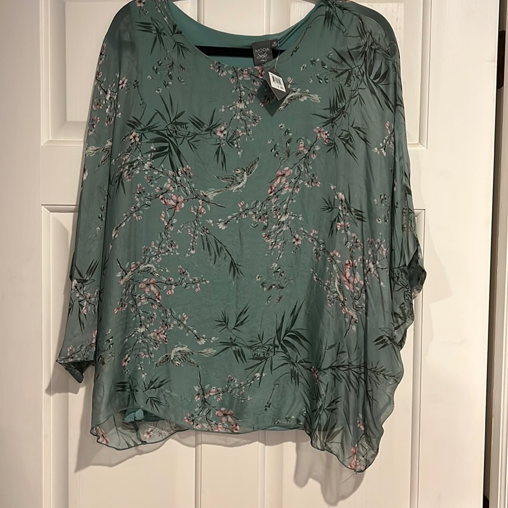 Sheer blouse with sewed in shell